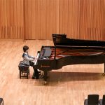 Leo Bailey Yang playing the piano