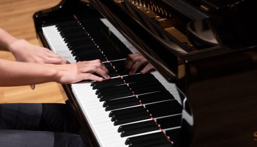 A student plays the piano at Chetham's School of Music