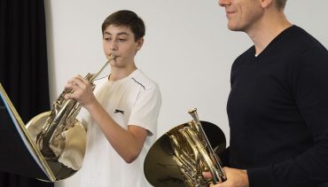A Chetham's student learns the French horn