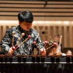 Fang leads Chetham's Symphony Orchestra on the marimba, February 2020, in The Stoller Hall