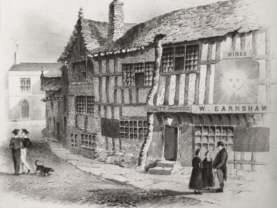 A print depicting the Sun Inn, a leaning timber-framed building. Two stone steps lead up to the door, above which is a sign reading ‘Poets’ Corner’; next to that is another sign depicting a sun with a face. 
