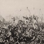 A print depicting the Peterloo Massacre. Several figures in early nineteenth-century dress stand on a raised platform carrying flags bearing political slogans, while mounted soldiers with swords ride through a crowd of panicked figures, trampling some underfoot.