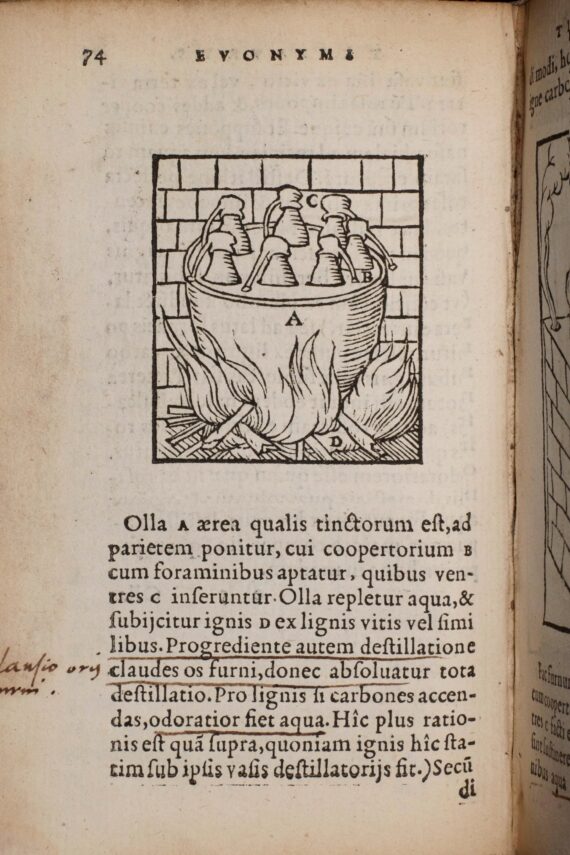 A woodcut illustration of an alchemical furnace. It depicts a cauldron above a fire, with glass vessels with spouts protruding from the lid. The text beneath the illustration has been underlined and annotated by Dee.