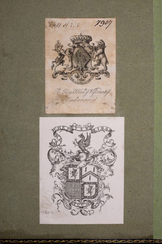 Two heraldic bookplates pasted down inside the front cover of Chetham’s Library’s copy of the Third Folio, one above the other.