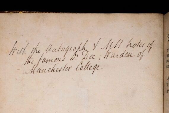 A blank page containing an annotation reading ‘With the autograph + MSS notes of the famous Dr Dee, Warden of Manchester College’, in a cursive hand in ink.