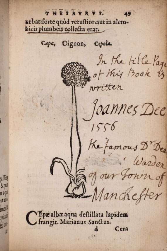 A printed page containing an illustration of a flower. In the margin is an annotation reading ‘In the title page of this book is written Joannes Dee 1556 the famous Dr Dee Warden of our Town of Manchester’, in a cursive hand in ink.