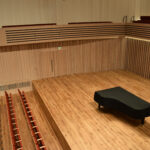 Piano on on stage in the Stoller Hall