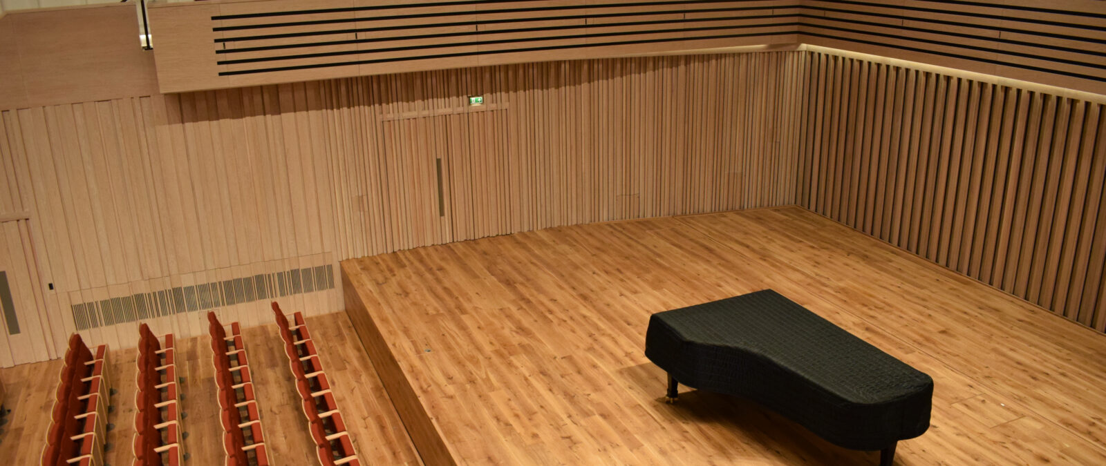 Piano on on stage in the Stoller Hall