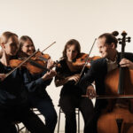 The Dudok string quartet playing their instruments ((violin, violin, viola and cello)