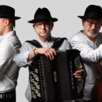 Members of folk band Kroke with violin, accordian and double bass