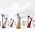 A group of harps surrounded by clouds