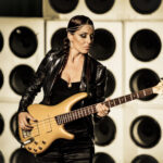 Musician Ida Neilsen with bass guitar