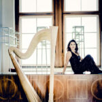 Harpist Annelean Lenaerts and harp