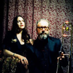 Songwriter Rennie and Bret Sparks, with a trombone