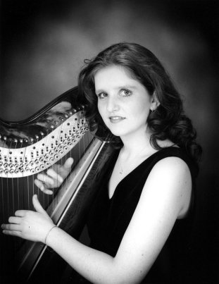 Black and white photo of harpist Rachel Dent