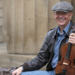 Musician Tom McConville with violin