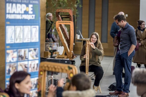 A harp being demonstrated