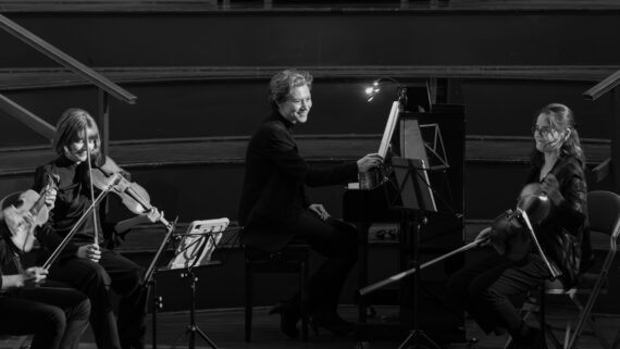 black and white image of musicians from Mystery Ensemble performing