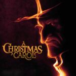 Text reads A Christmas Carol with a figure silhouetted in orange