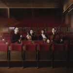 Leonkoro Quartet seated in a theatre