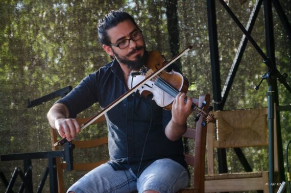 Violinist Ayman Hlal performing