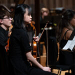 String students from Chetham's performing at the Stoller Hall