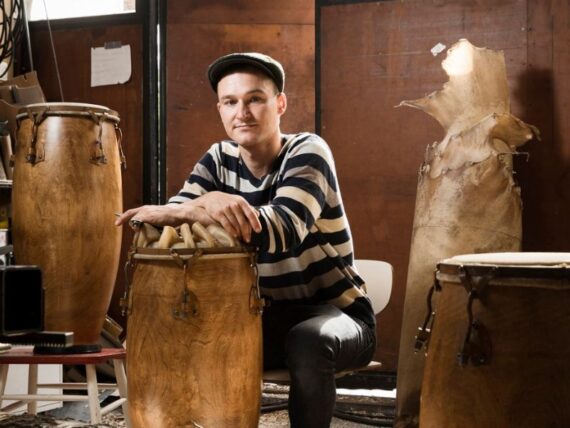 Musician Ossi Raippalinna with drums