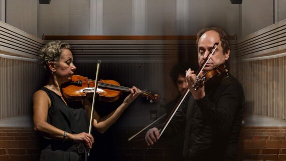 violinists for the Opera e Lirica concert with stoller hall in background