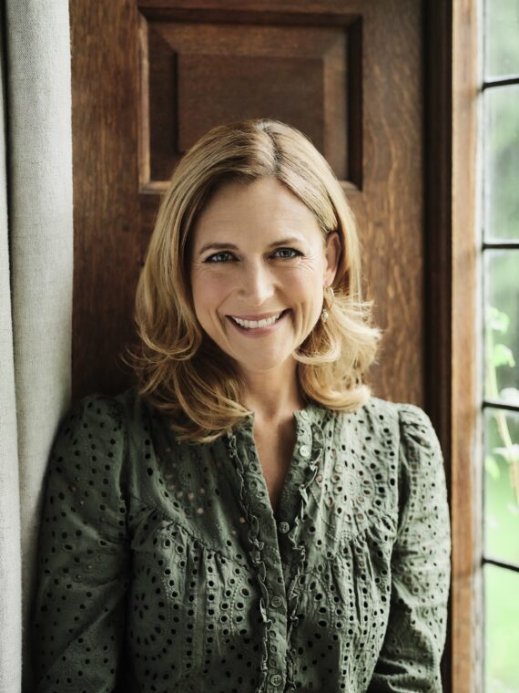 Headshot of BBC presenter Katie Derham, wearing a green top