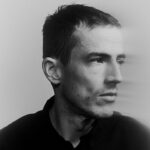 black and white image of artist Charlie Cunningham