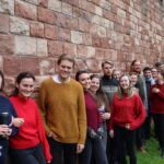 Members of Kanto chamber choir in Christmas-themed jumpers