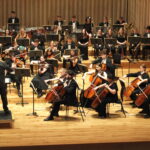 City of Sheffield Youth Orchestra performing on stage