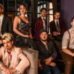Members of jazz band The Easy Rollers, seated