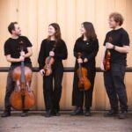 Members of the Talland String Quartet with instruments