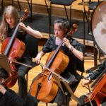 Chetham's Students playing cellos.