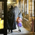 Visitors in the library dresssed in witch costumes